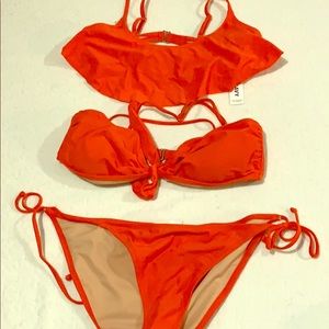 2 bathing suit tops. 1 bottom